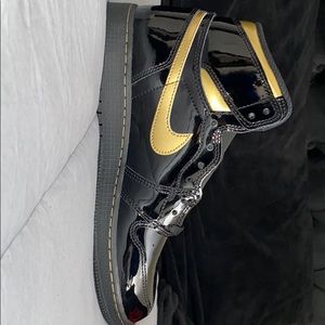 Jordan Black and Gold Sneakers